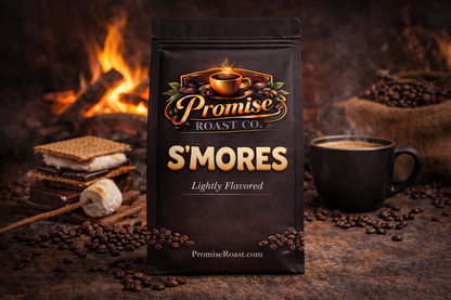 Bag of Promise Roast Co. S'mores flavored coffee with a fire and coffee cup in the background