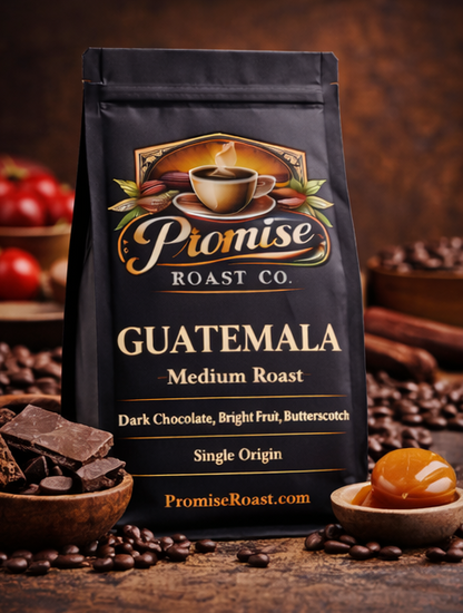 Coffee bag from Promise Roast Co. on a wooden surface with coffee beans and chocolate.